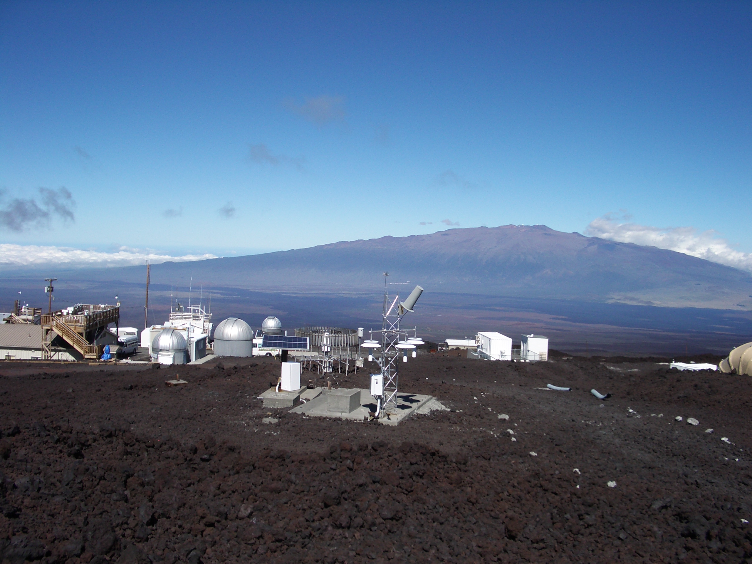U.S. Climate Reference Network climate observing station on Mauna Loa in Hawaii  (Mauna Kea in the background).